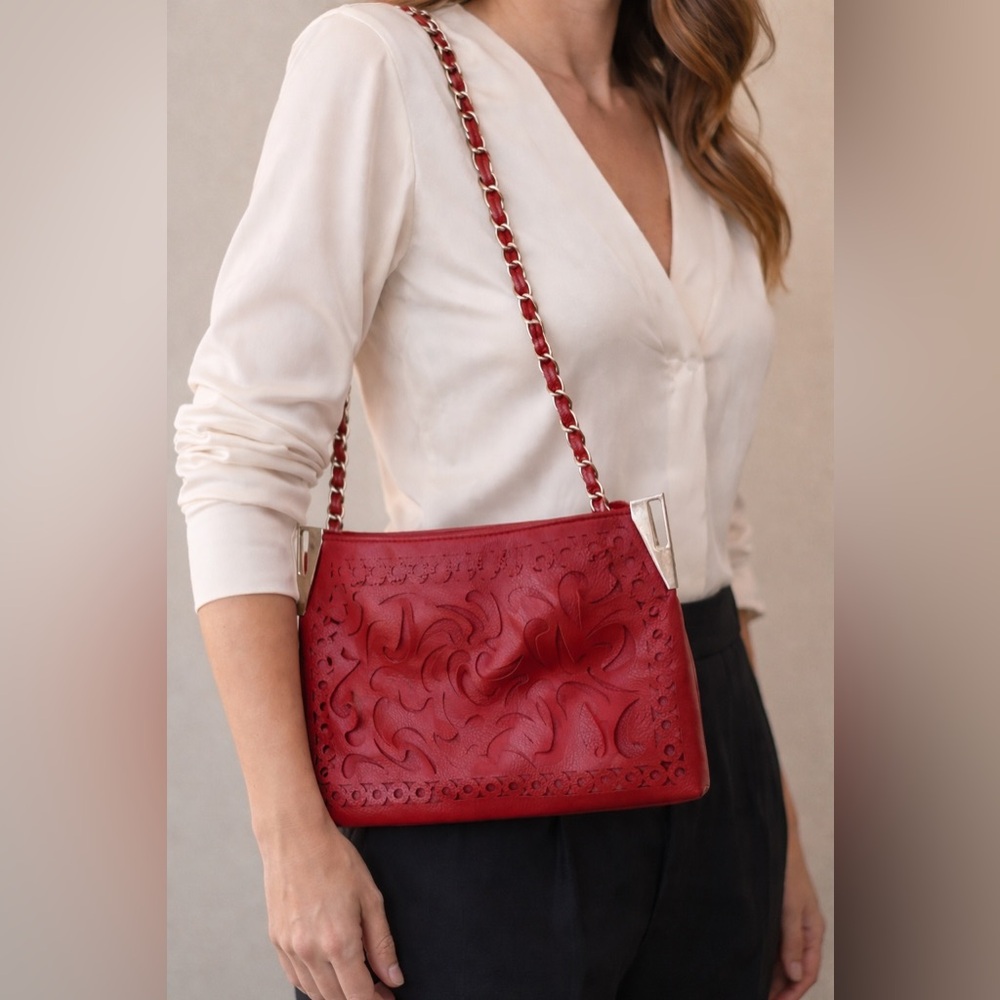 Handmade artisan laser cut leather bag artist unknown. Pristine real silk lining